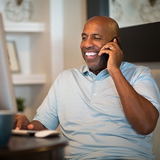 Man smiling with dental implants in Zionsville