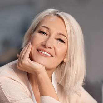 Woman smiling with dental implants in Zionsville