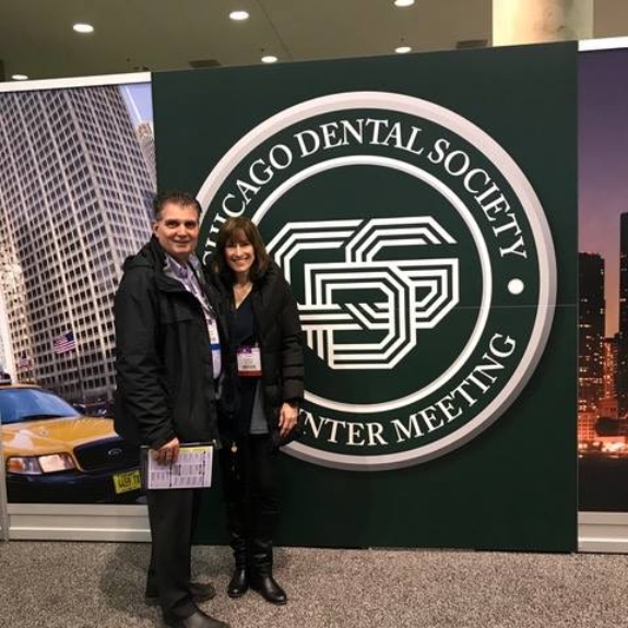 Doctor Julovich and wife outside of Chicago Dental Society conference