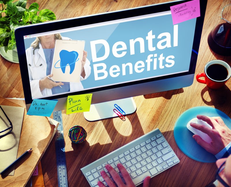 Patient reviewing dental benefits on computer