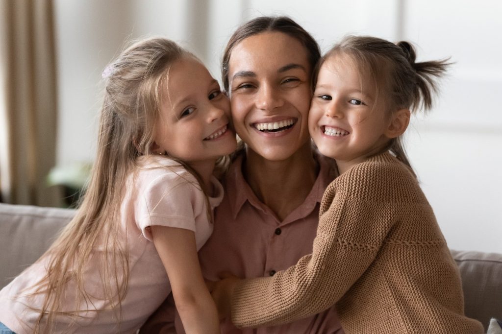 parents and two children smiling