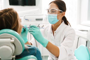 a patient undergoing scaling and root planing